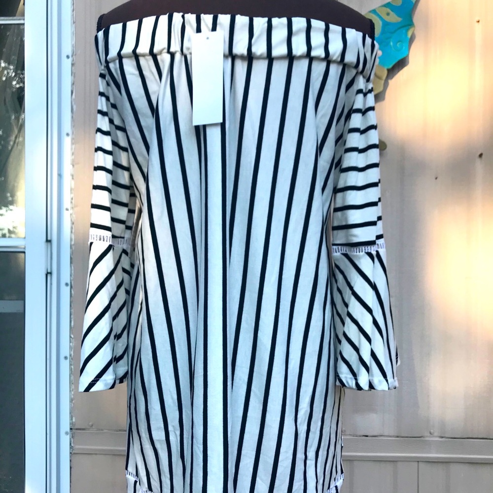 Black and white striped off the shoulder bell top